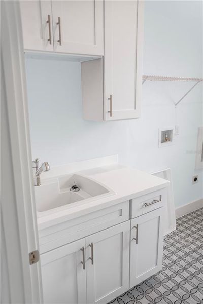 Laundry rm cabinetry and sink