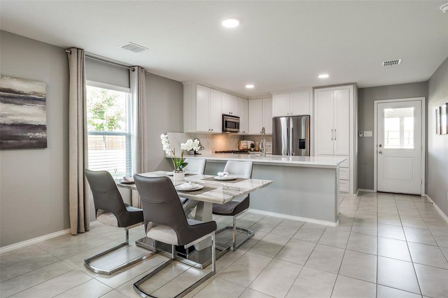 Breakfast area with room for barstools.