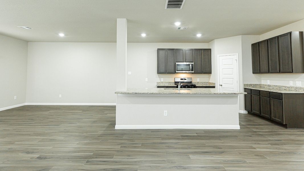 Family Room to Dining Area and Kitchen