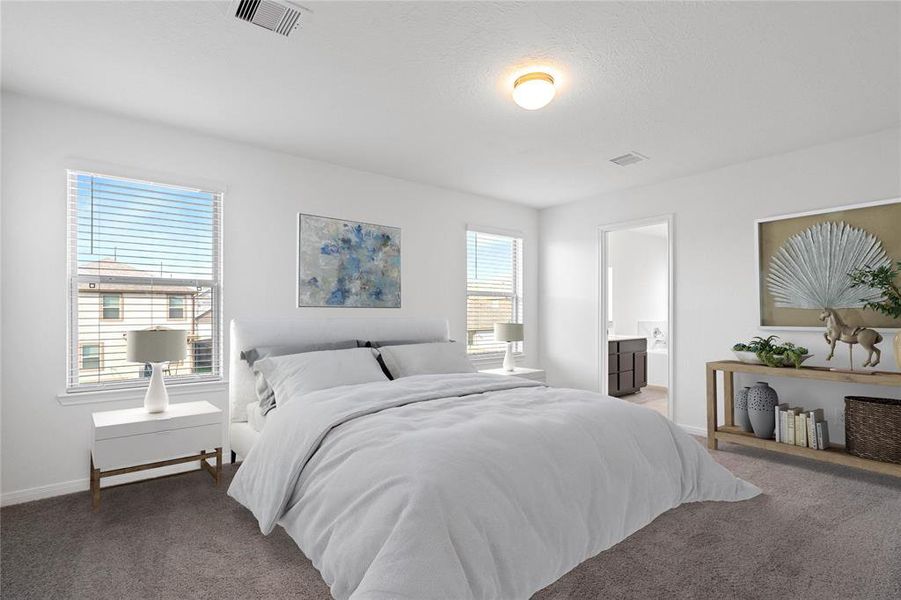 What a wonderful place to come home to, this stunning primary suite greets you with plush carpet floors, a warm custom paint, high ceiling, lighting, large windows with blinds allowing in natural light brightening up this spacious primary bedroom.