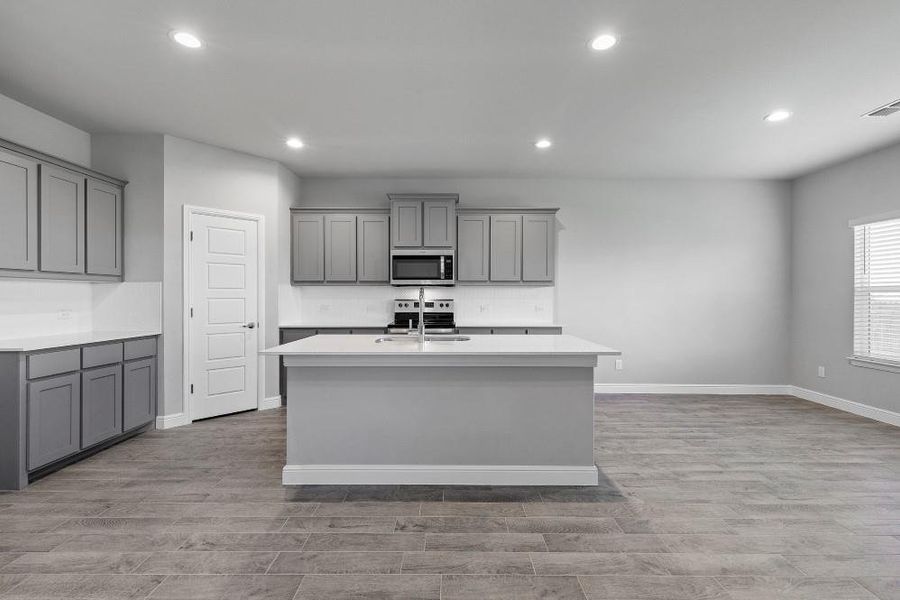 Kitchen - All Home and community information, including pricing, included features, terms, availability and amenities, are subject to change at any time without notice or obligation. All Drawings, pictures, photographs, video, square footages, floor plans, elevations, features, colors and sizes are approximate for illustration purposes only and will vary from the homes as built.