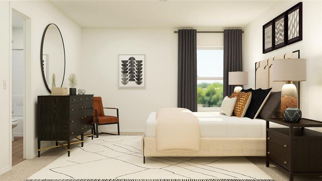 Bedroom featuring light carpet and ensuite bath