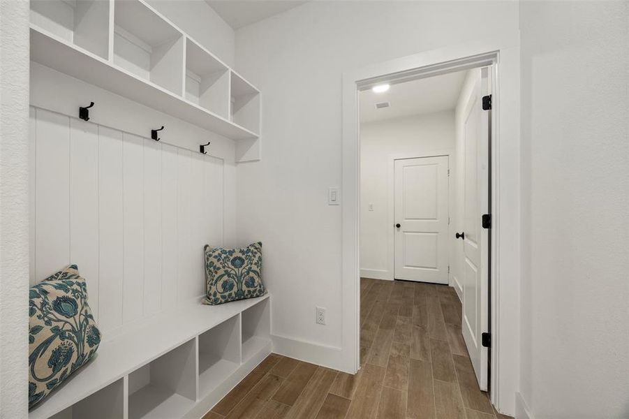 Mudroom featuring hardwood / wood-style flooring