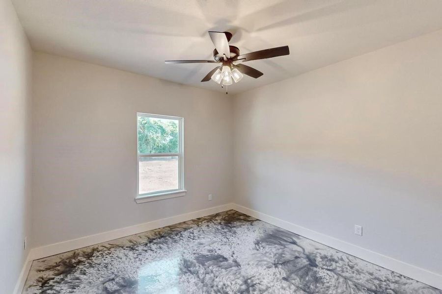 Unfurnished room with ceiling fan