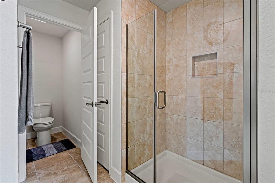 Primary bathroom - large shower and private water closet