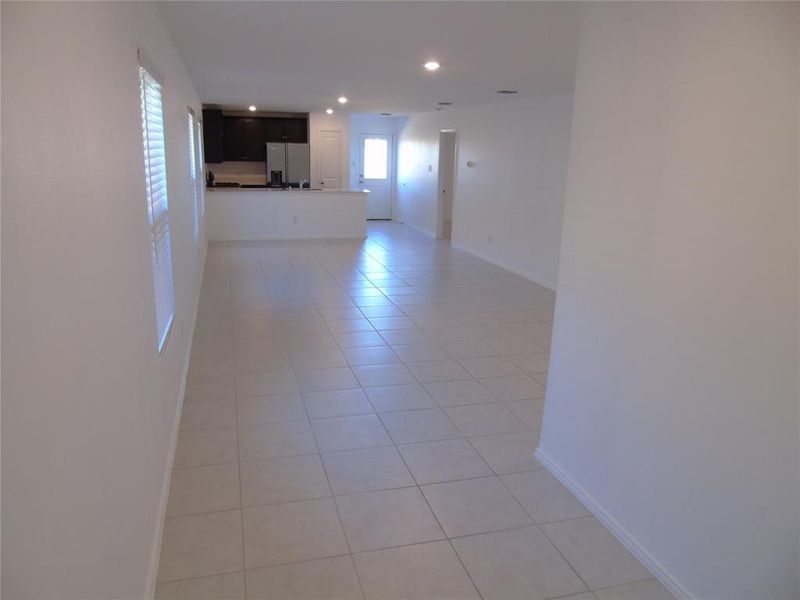 Spare room featuring light tile patterned floors