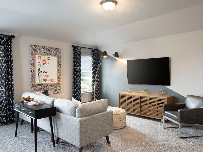 Enjoy movie and game nights in the second story loft.