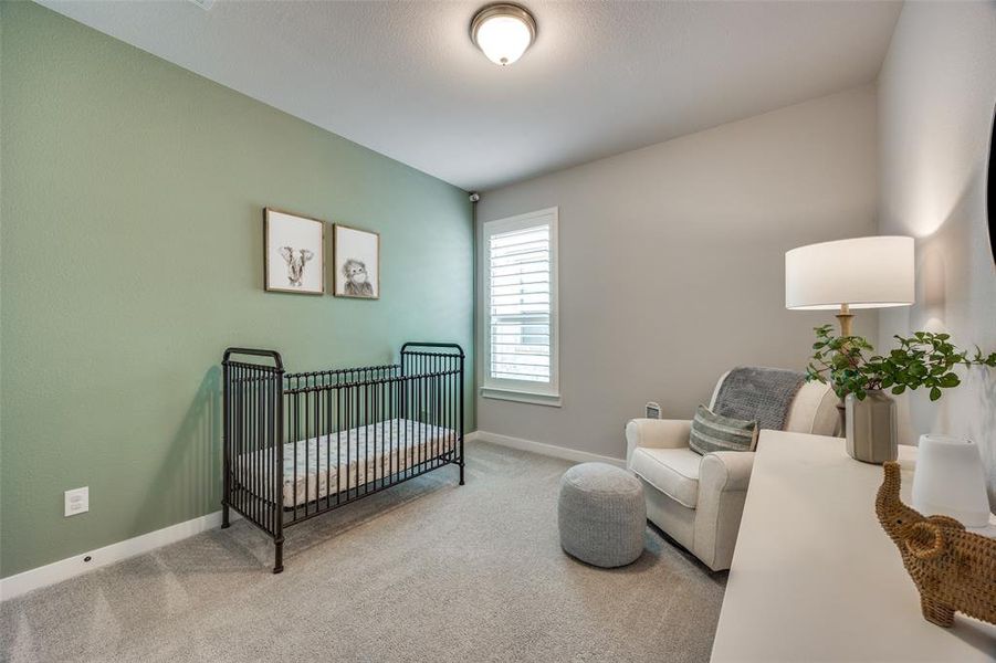 Bedroom with carpet flooring