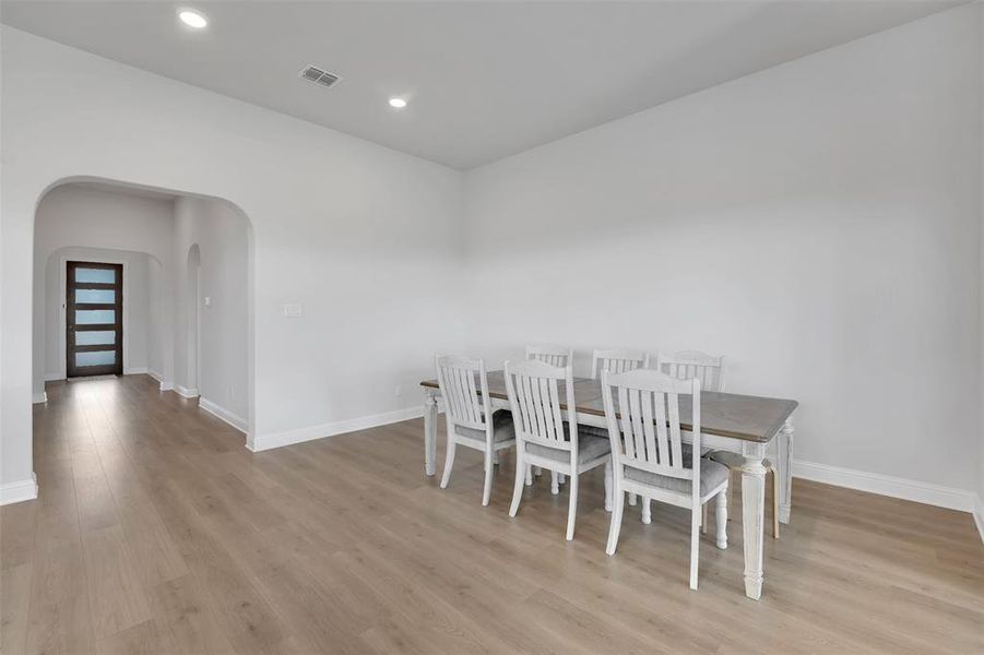 Dining space featuring light hardwood / wood-style flooring