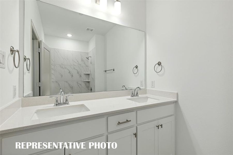 Friends and family will feel right at home in this beautifully finished guest bath!  REPRESENTATIVE PHOTO