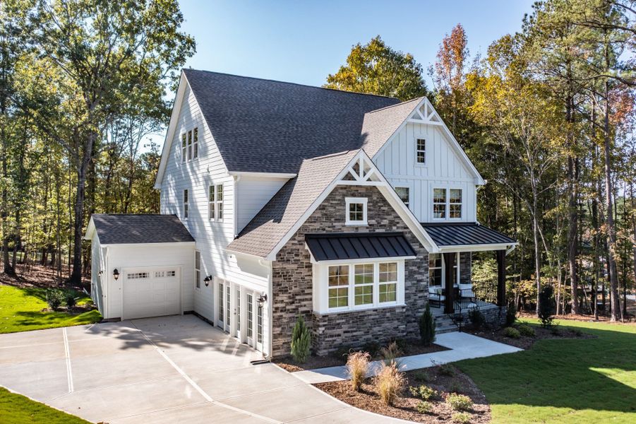 Farmhouse Side View- 3 Car Garage