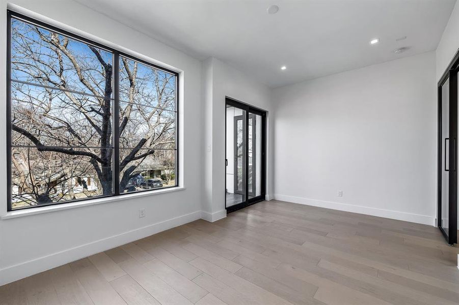 Empty room featuring hardwood / wood-style floors