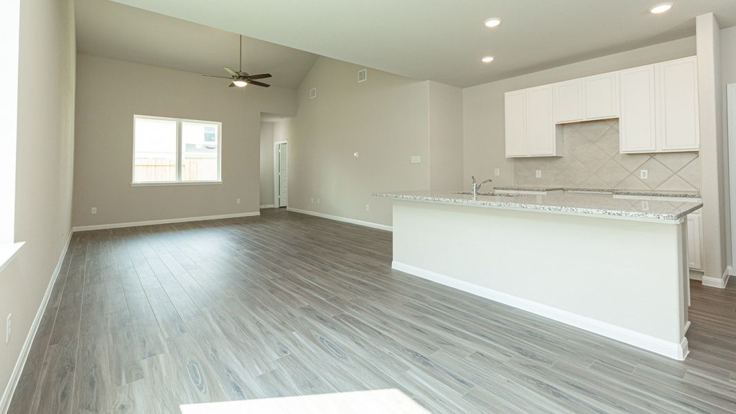 Dining Area to Kitchen and Family Room