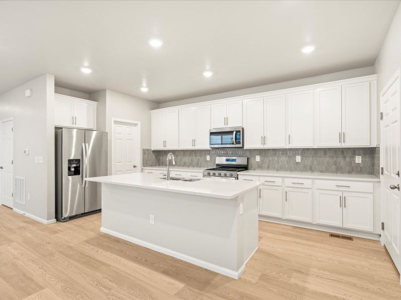 The Vail floorplan interior image taken at a Meritage Homes community in Northern Colorado.