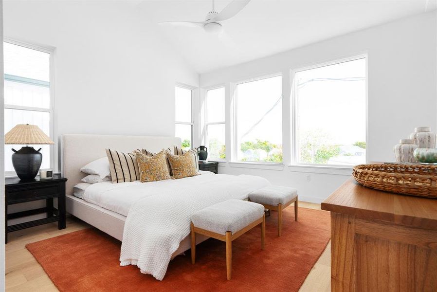 Bright, comfortable bedroom with modern furnishings and soothing neutral tones.