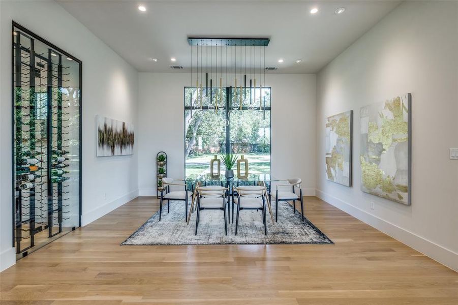 Dining area with light wood-type flooring