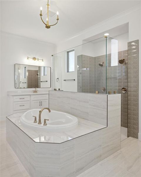 Bathroom featuring vanity, independent shower and bath, a chandelier, and tile patterned floors