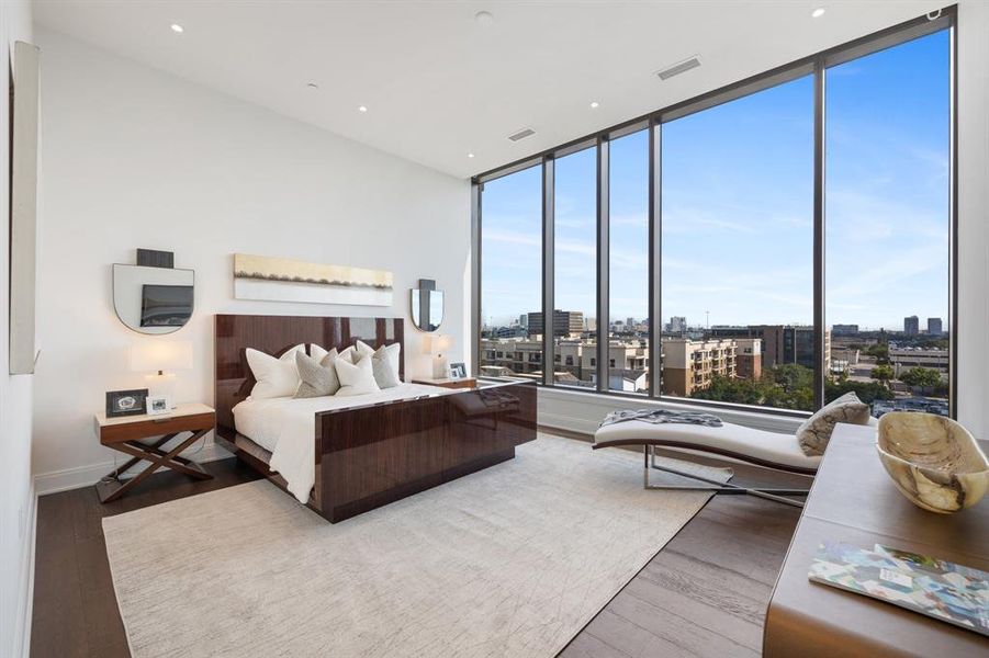 Primary suite has room for sitting area to enjoy views and start or end your day.  Wide plank hardwood floors, ceiling heights of nearly 12 feet on the 7th floor and recessed lights.