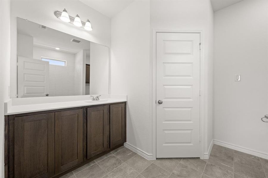 Bathroom featuring vanity