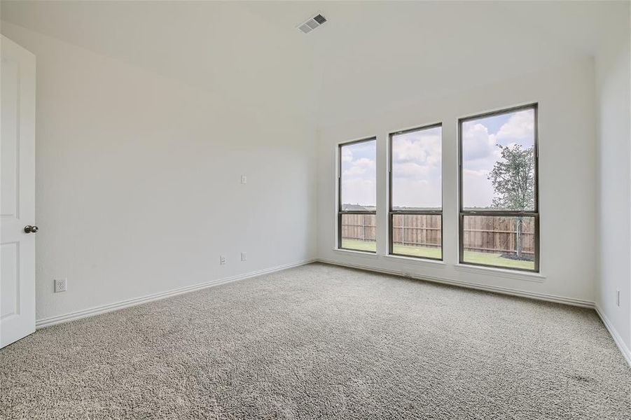 View of carpeted spare room