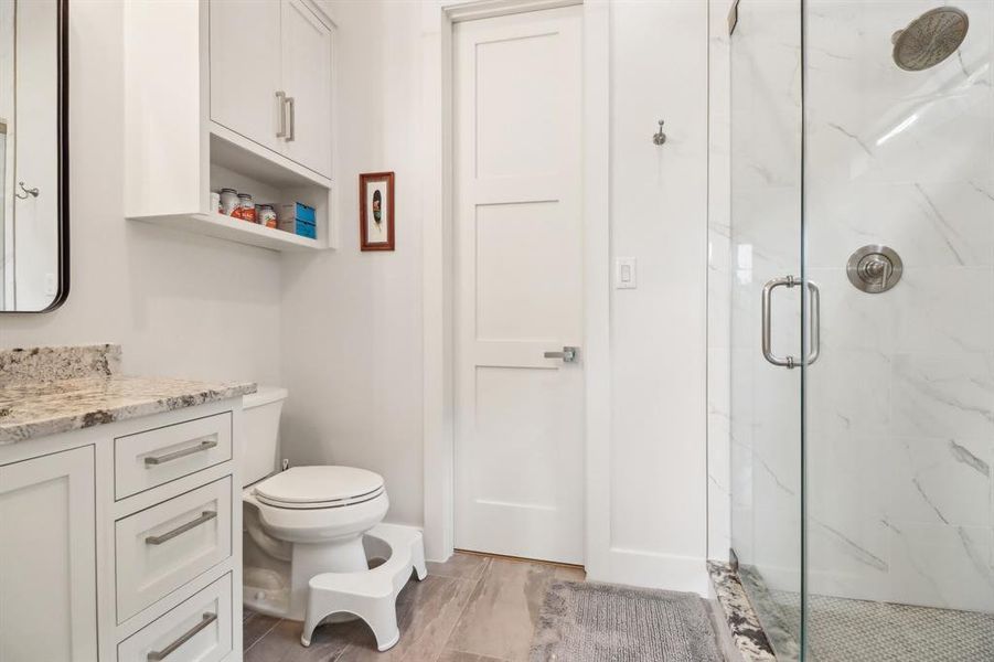 The fourth full secondary bathroom also features a dedicated shower.