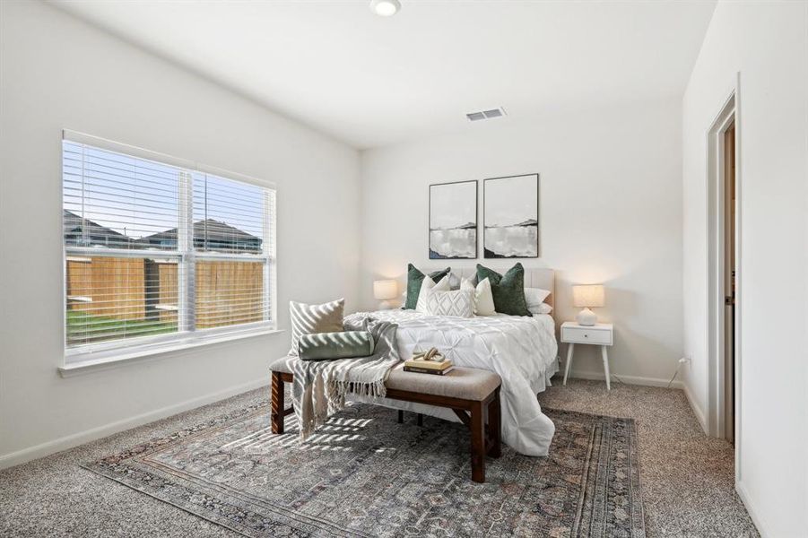 Bedroom featuring carpet