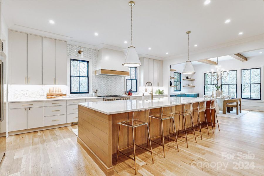 Custom cabinets provide lots of storage - even underneath the island