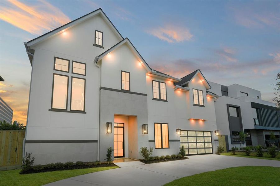 Magnificent new construction in the River Oaks Area. Blocks from Central market and Highland Village. The gas coach lamps, custom windows and doors set the tone for the exceptional attention to detail you will find inside.