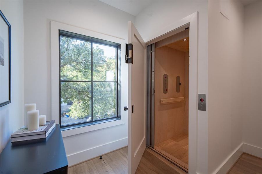 Bathroom with wood-type flooring