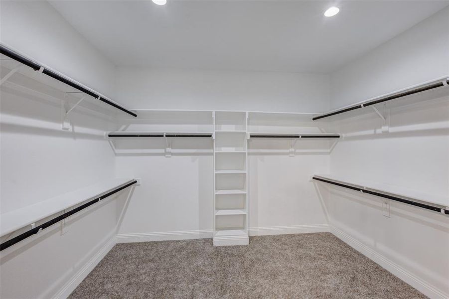 Spacious master closet featuring plenty space