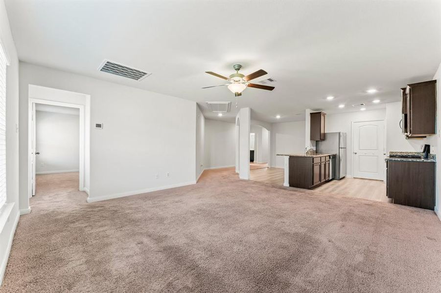 Another view of the Family room.  The owner's suite is located off of this room, while the secondary bedrooms are located in the front of the home.