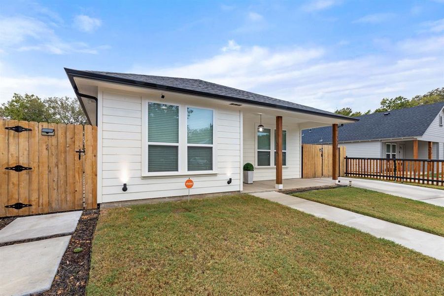 View of front of home with a front lawn