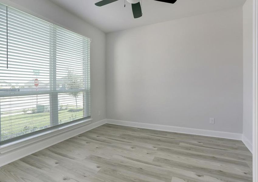 Formal dining or study off of the entry with large windows.