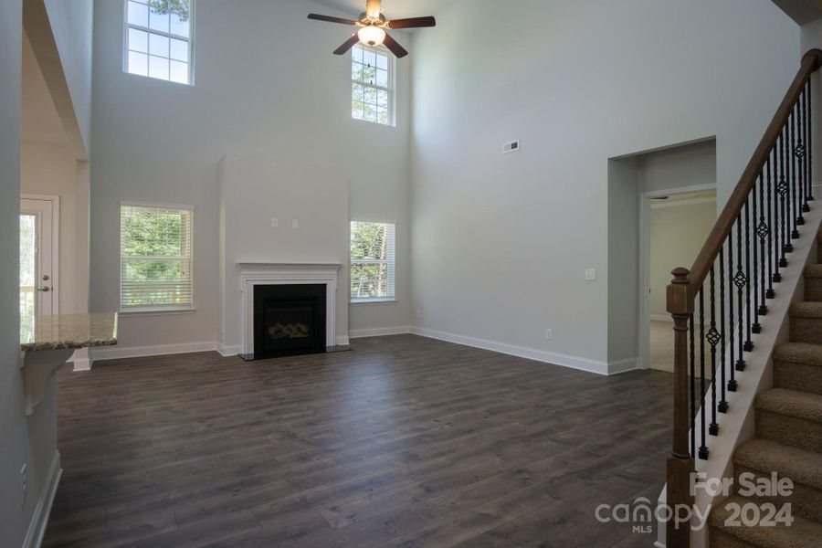Foyer into Family Room. Photo representation. Colors and options will differ.