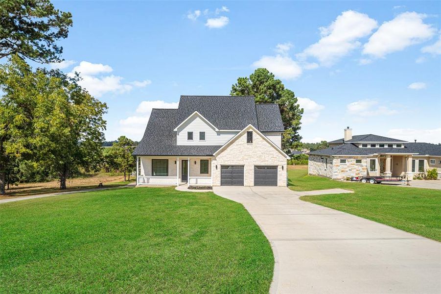 Front of home with sprinkler system