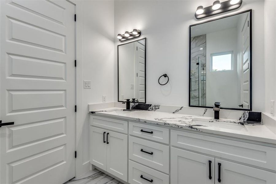 Double vanity with natural stone.