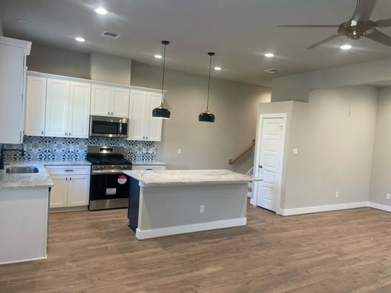 Living room, dining and kitchen open floor plan