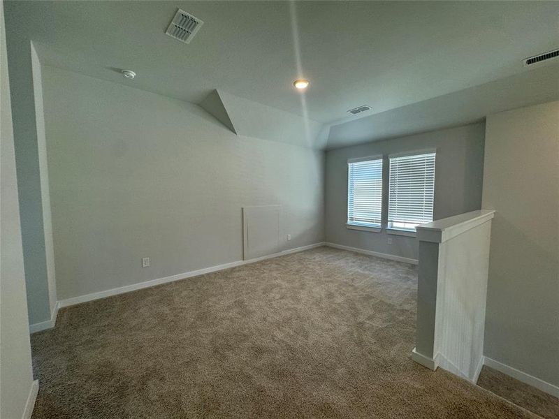 Your family will enjoy the Game Room that overlooks the family room.