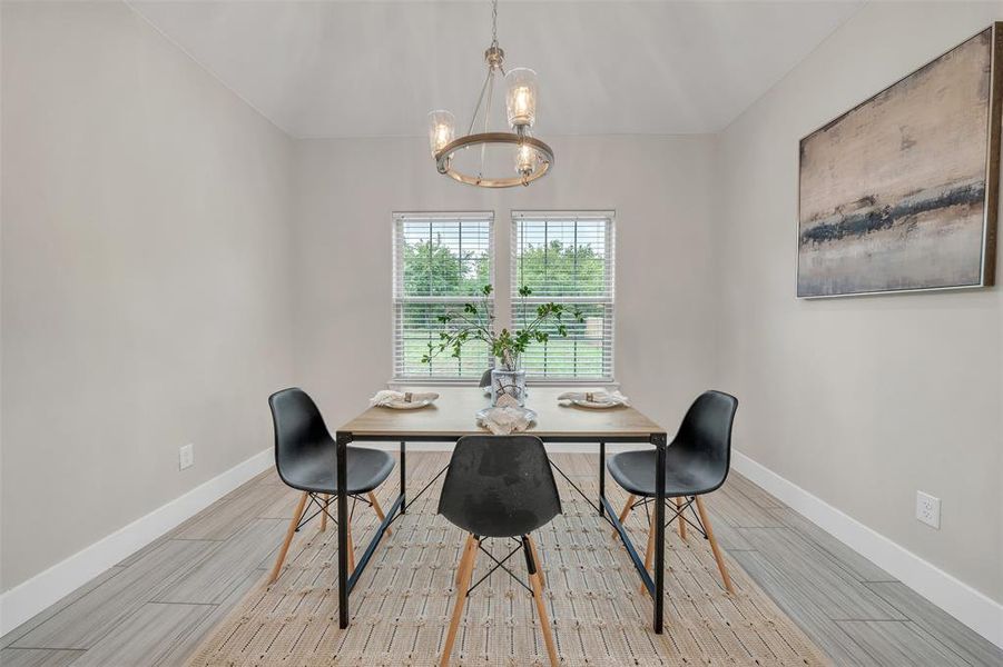 Dining area featuring an inviting chandelier