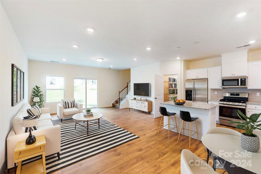 Family room shown with virtual staging