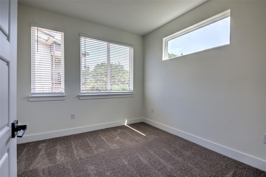Third bedroom with large windows