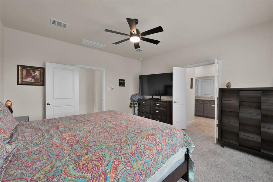 Another vantage point of your primary bedroom.  Notice the large scale furniture proving the spaciousness of this room.