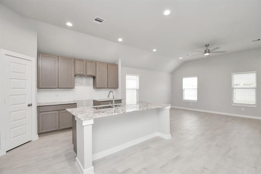 This generously spacious kitchen is a dream realized!