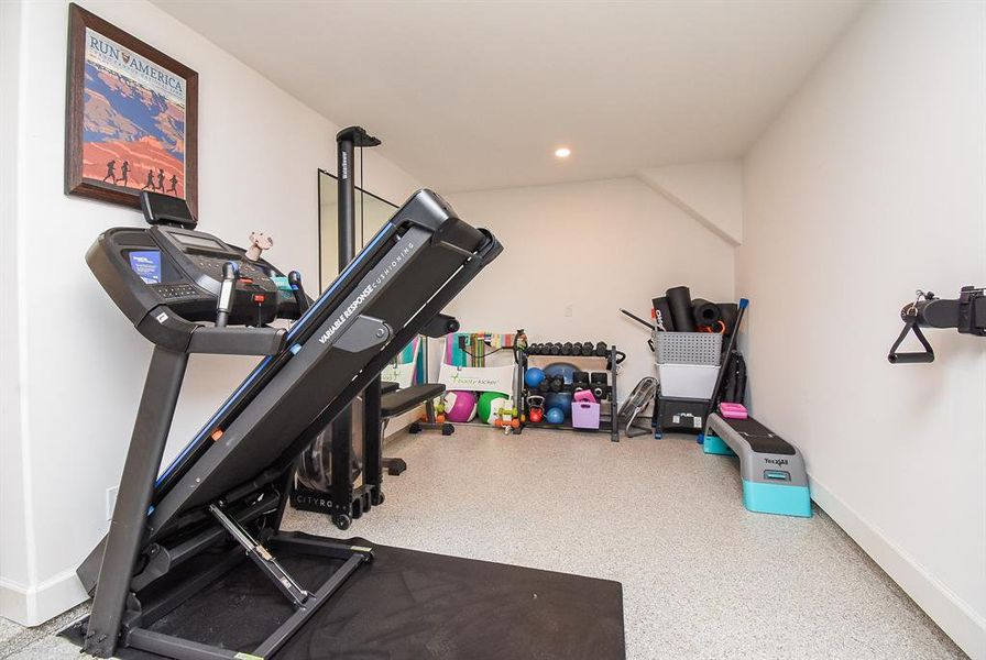 Exercise area used in garage.