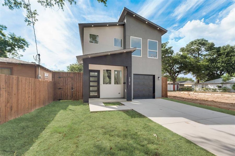 Modern home featuring a front yard