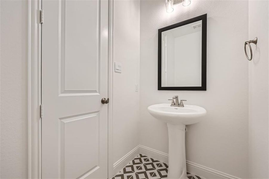 Bathroom featuring tile flooring