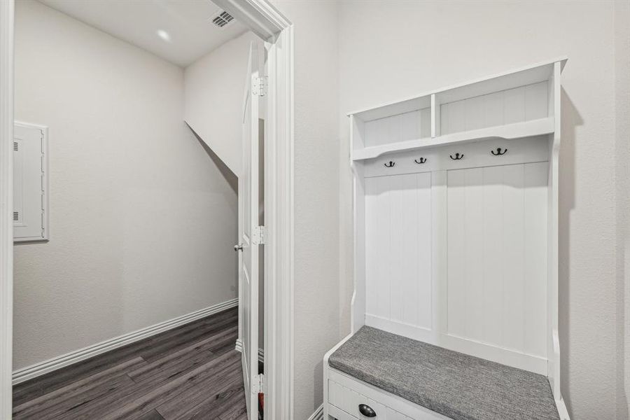 Mudroom with dark wood-type flooring