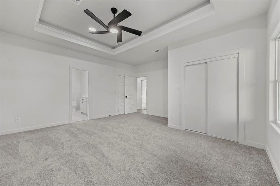 Spare room with ceiling fan and light hardwood / wood-style floors