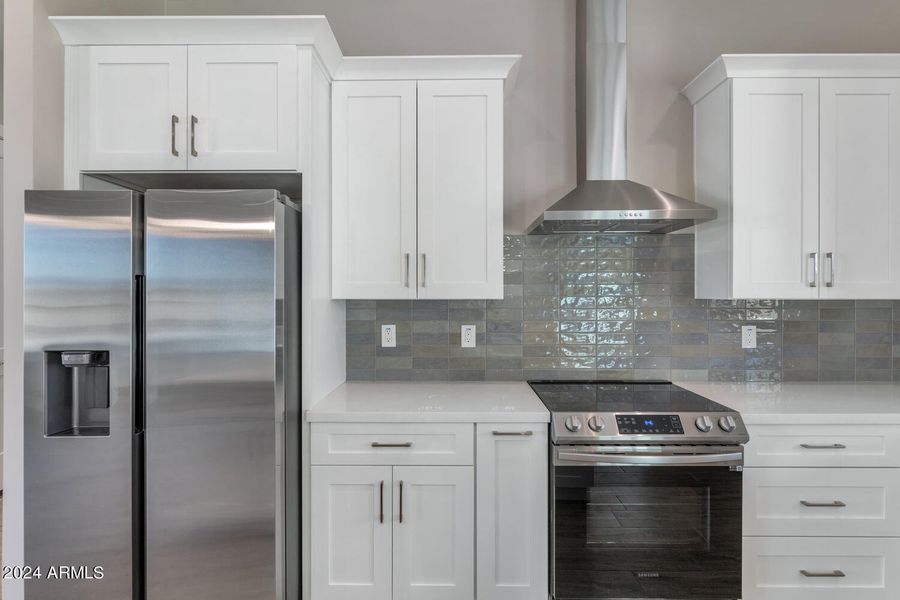 Custom Glass tile backsplash.