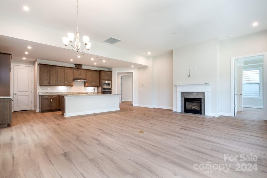 Upgraded LVP low maintenance flooring, added recessed can lighting, neutral paint and the gorgeous Gourmet Kitchen make this home perfect in every way!